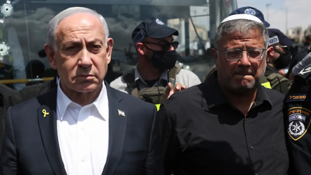 Israel-s-Prime-Minister-Benjamin-Netanyahu-and-National-Security-Minister-Itamar-Ben-Gvir-right-visit-the-site-of-a-shooting-attack-at-a-bus-stop-in-Jerusalem-Monday-Sept-8-2025