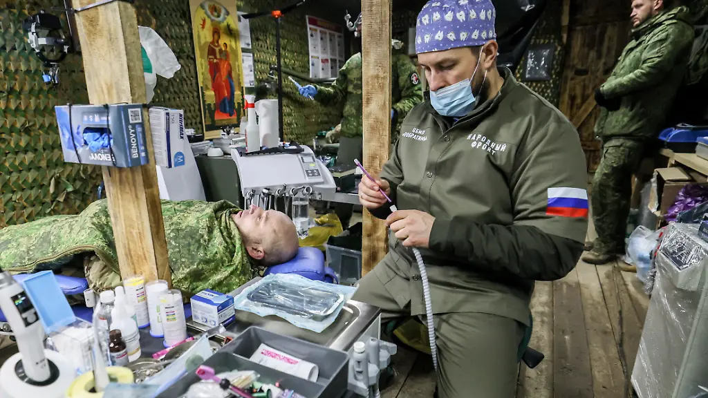 RUSSIA-KHERSON-REGION-FEBRUARY-19-2026-A-dentist-of-the-Pobratim-medical-centre-treats-a-serviceman-in-the-zone-of-Russia-s-special-military-operation