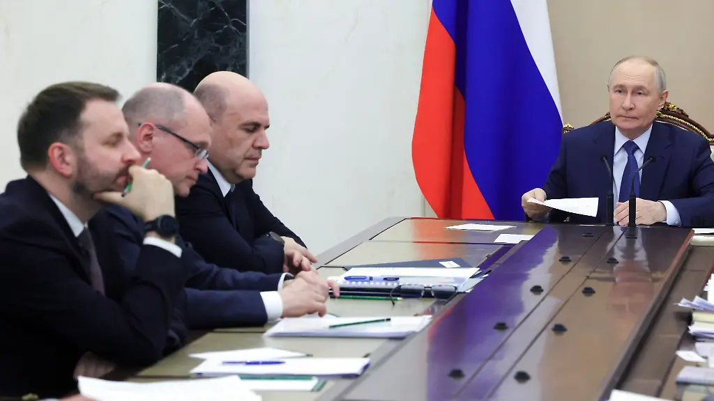 Russian-President-Vladimir-Putin-right-holds-a-meeting-on-economic-issues-at-the-Kremlin-in-Moscow-Russia-Friday-May-15-2026