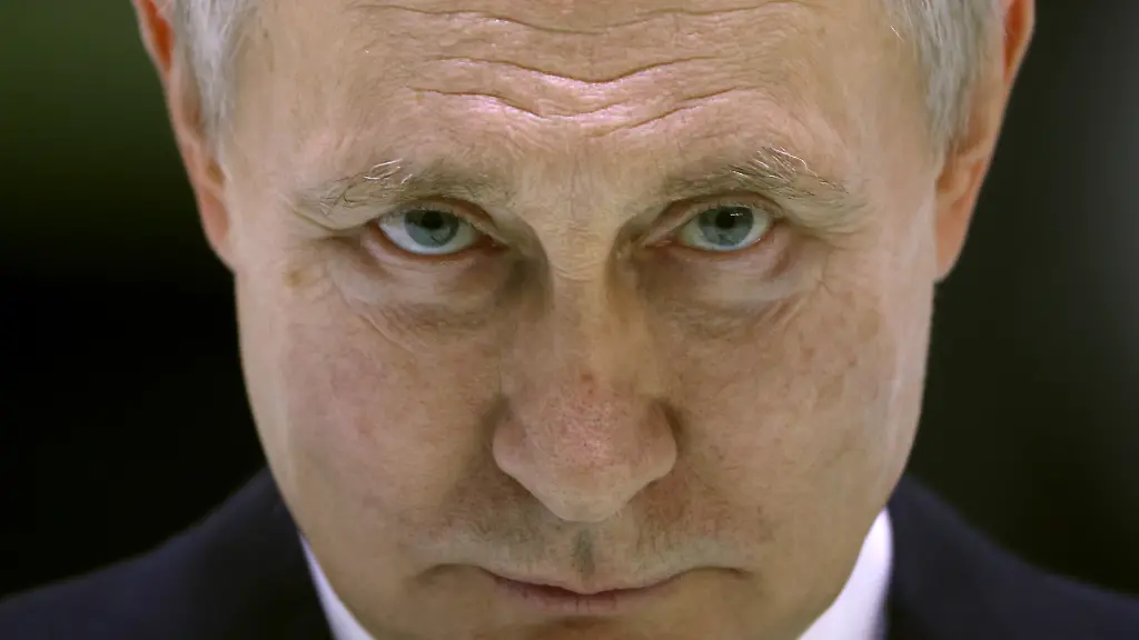 SAINT-PETERSBURG-RUSSIA-JANUARY-18-RUSSIA-OUT-Russian-President-Vladimir-Putin-speaks-as-he-meets-with-workers-at-the-Obukhov-State-Plant-January-18-2023-in-Saint-Petersburg-Russia