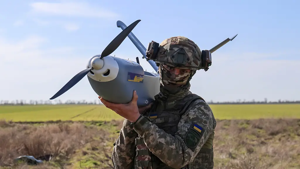 KHERSON-OBLAST-UKRAINE-MARCH-14-A-serviceman-of-the-34th-Coastal-Defense-Brigade-with-the-call-sign-Shok-holds-the-GOR-drone-a-Ukrainian-reconnaissance-aircraft-that-servicemen-use-to-detect-Russian-enemy-positions-at-the-launch-point-on-March-14-2025-in-Kherson-Oblast-Ukraine-The-34th-Coastal-Defense-Brigade-was-recently-formed-based-on-the-124th-Territorial-Defense-Brigade-which-has-been-fighting-for-Kherson-since-the-first-days-of-the-Russian-full-scale-invasion-2022-Over-the-past-three-years-the-brigade-s-units-have-also-fought-in-other-areas-of-the-front-but-now-as-part-of-the-Ukrainian-Marine-Corps-the-military-is-defending-the-liberated-part-of-the-Kherson-region-from-new-Russian-attacks-from-the-left-bank-of-the-Dnipro-The-Dnipro-River-separates-the-part-of-Kherson-region-occupied-by-Russian-troops-from-the-liberated-Ukrainian-one-From-the-left-bank-the-Russian-army-strikes-cities-and-villages-every-day-A-positional-war-continues