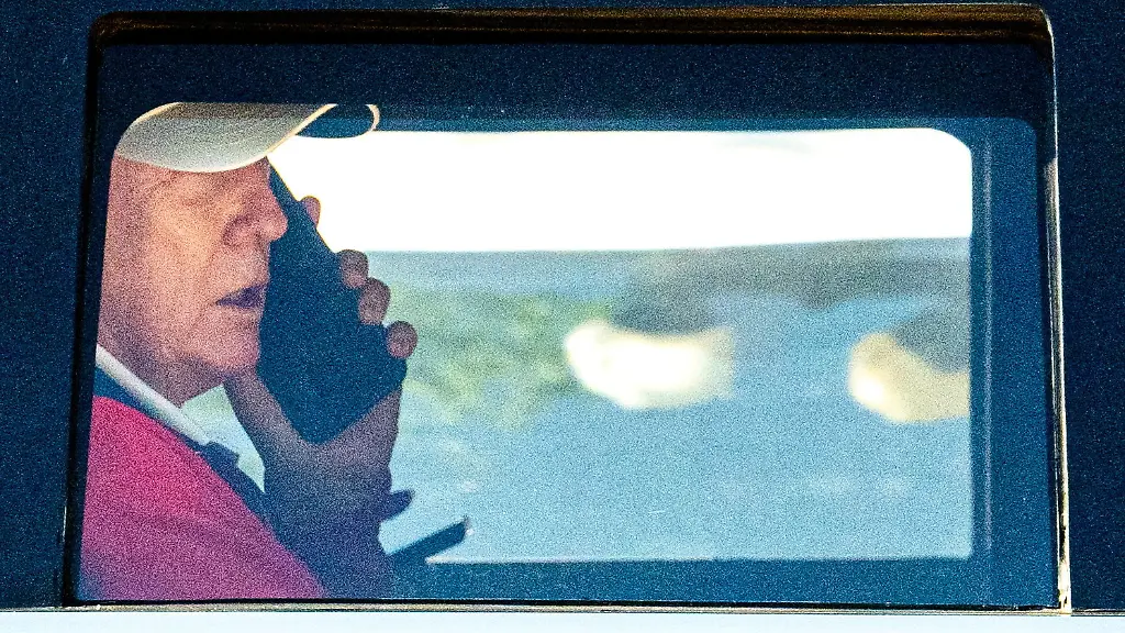 U-S-President-Donald-Trump-talks-on-the-phone-as-he-departs-the-White-House-for-Trump-National-Golf-Club-in-Sterling-Virginia-U-S-May-31-2026