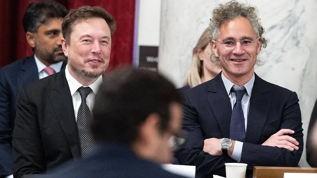US-Senate-Bipartisan-Artificial-Intelligence-AI-Forum-Washington-Elon-Musk-Chief-Executive-Officer-Tesla-SpaceX-and-X-previously-known-as-Twitter-left-and-Alex-Karp-co-founder-and-Chief-Executive-Officer-of-Palantir-right-appear-at-the-United-States-Senate-Bipartisan-Artificial-Intelligence-AI-Forum-in-the-Kennedy-Caucus-Room-on-Capitol-Hill-in-Washington-DC-on-Wednesday-September-13-2023-Photo-by-Ron-Sachs-CNP-ABACAPRESS