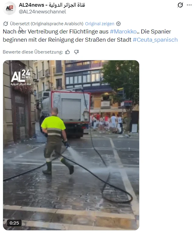Videostandbild von Straßenreinigern; im Hintergrund sind weiß gekleidete Menschen mit roten Halstüchern zu sehen.