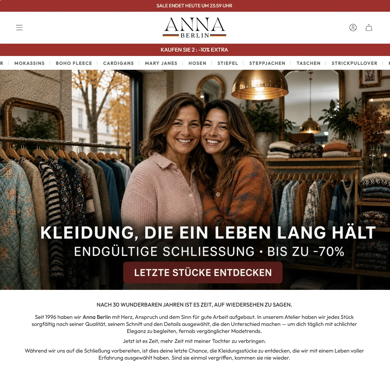 Startseite von Anna Berlin: rote Sale-Leiste, Logo mit Deutschlandfarben, Foto von zwei dunkelhaarigen Frauen in einer Boutique, darüber der Text „Kleidung, die ein Leben lang hält – Endgültige Schließung – bis zu -70 %“.