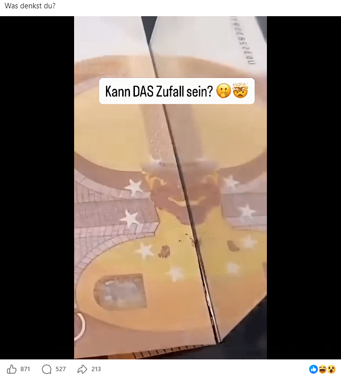 Spiegelkante an einem 50-Euro-Schein: Wieder ergibt der gespiegelte Ausschnitt ein anderes symmetrisches Muster.