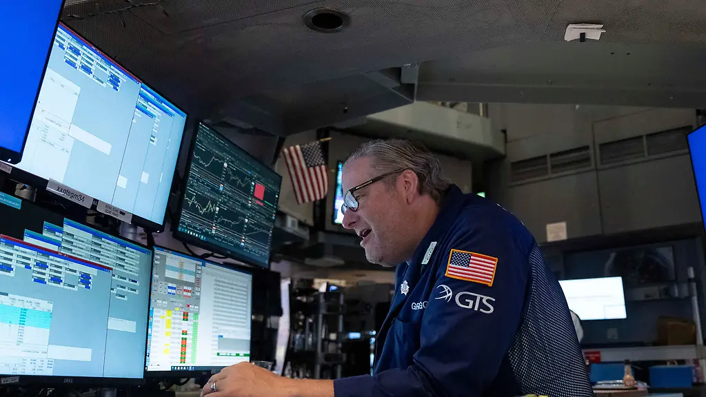 Fed-Gouverneur beruhigt Sorgen: Hoffnungen auf Zinspause beflügeln Wall Street