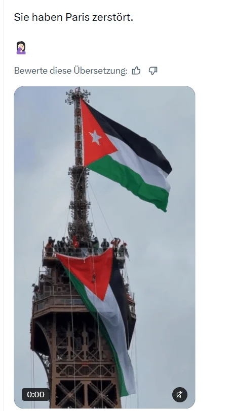 Screenshot des X-Posts mit zwei Flaggen und auffällig großen Personen an der Spitze des Eiffelturms